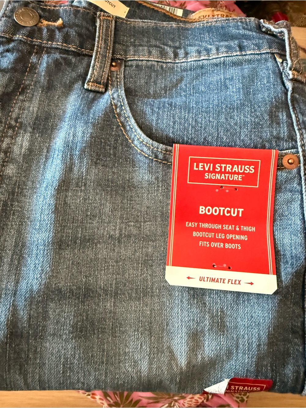 Signature by Levi Strauss Men's Bootcut Jeans in Medium Blue with Red Tag